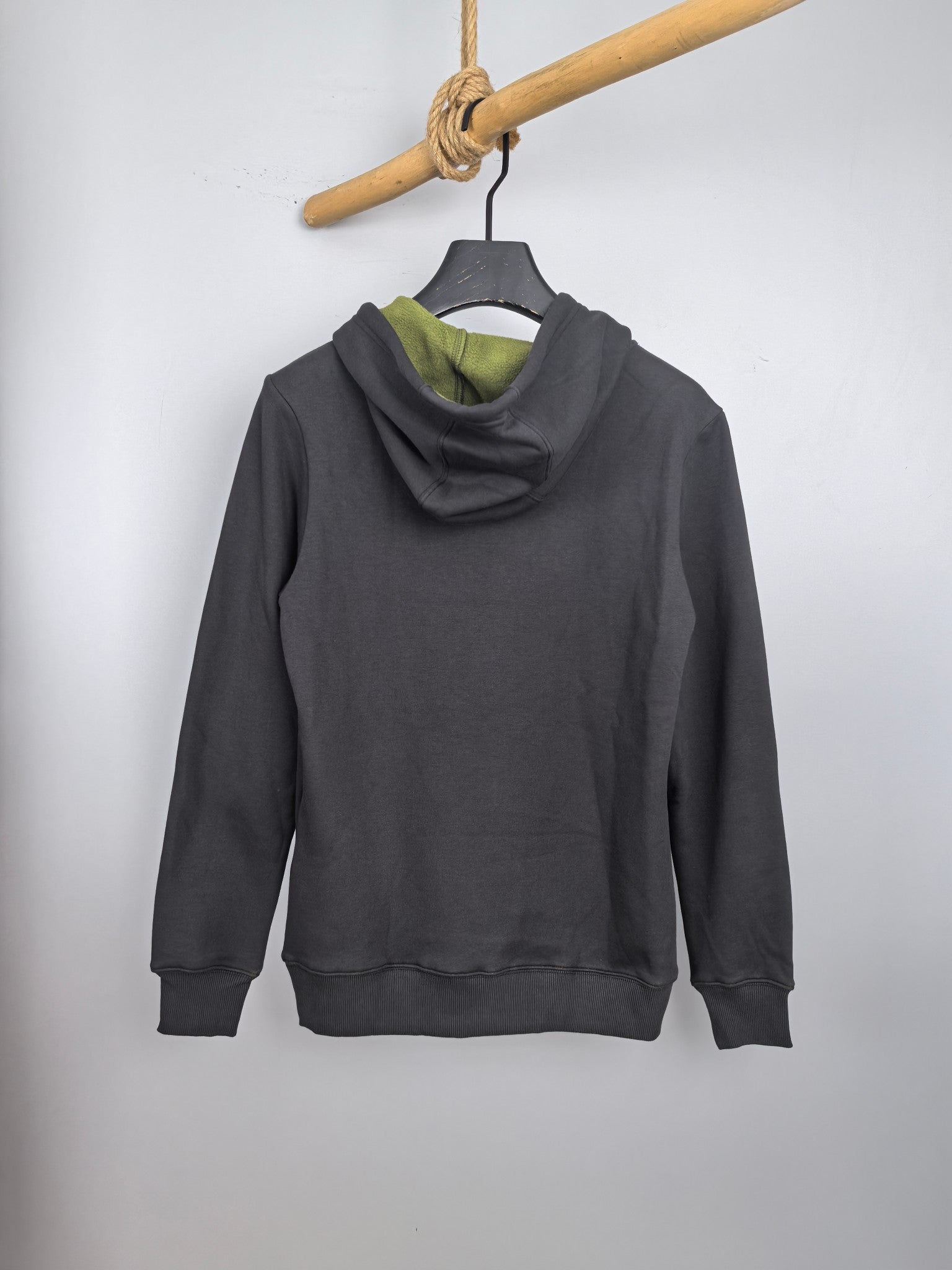 Dark gray zip-up hoodie back view with neon green hood lining and drawstrings