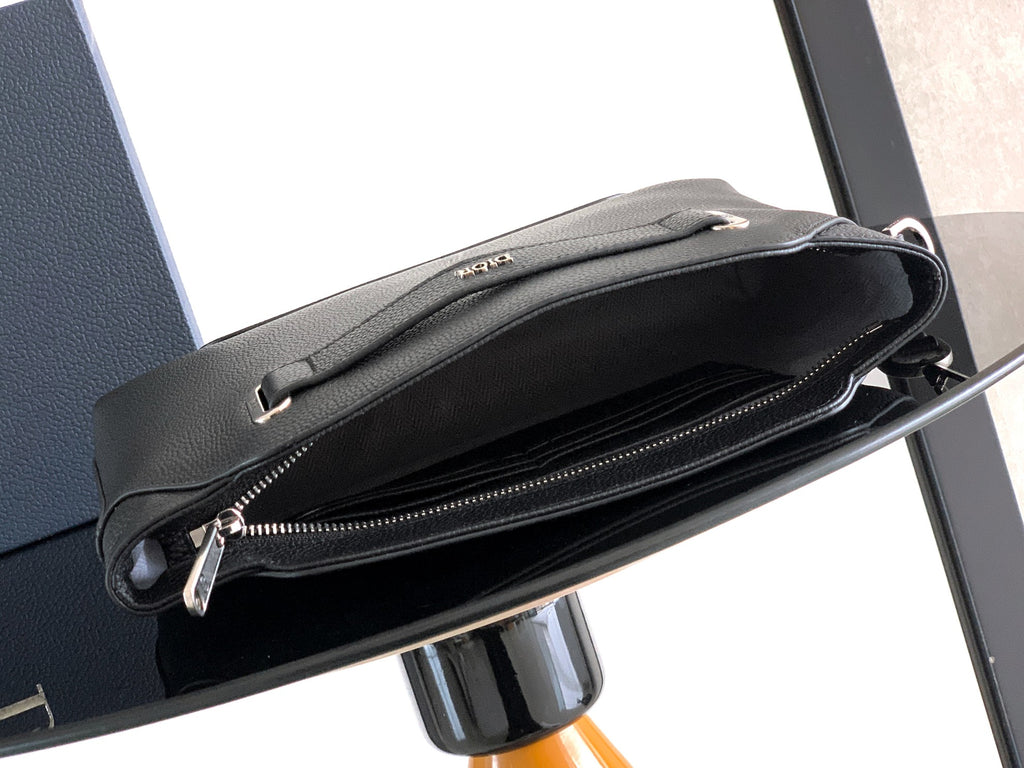 Dior bag top opening with zipper track and dark interior lining.