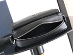 Dior leather bag with double zip closure and black fabric lining