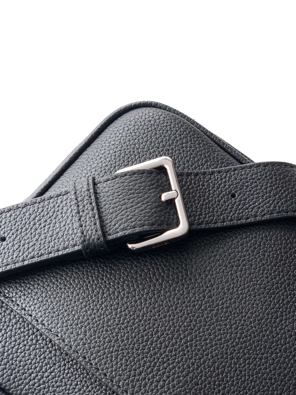 Dior leather strap with silver buckle and pebble-grain texture