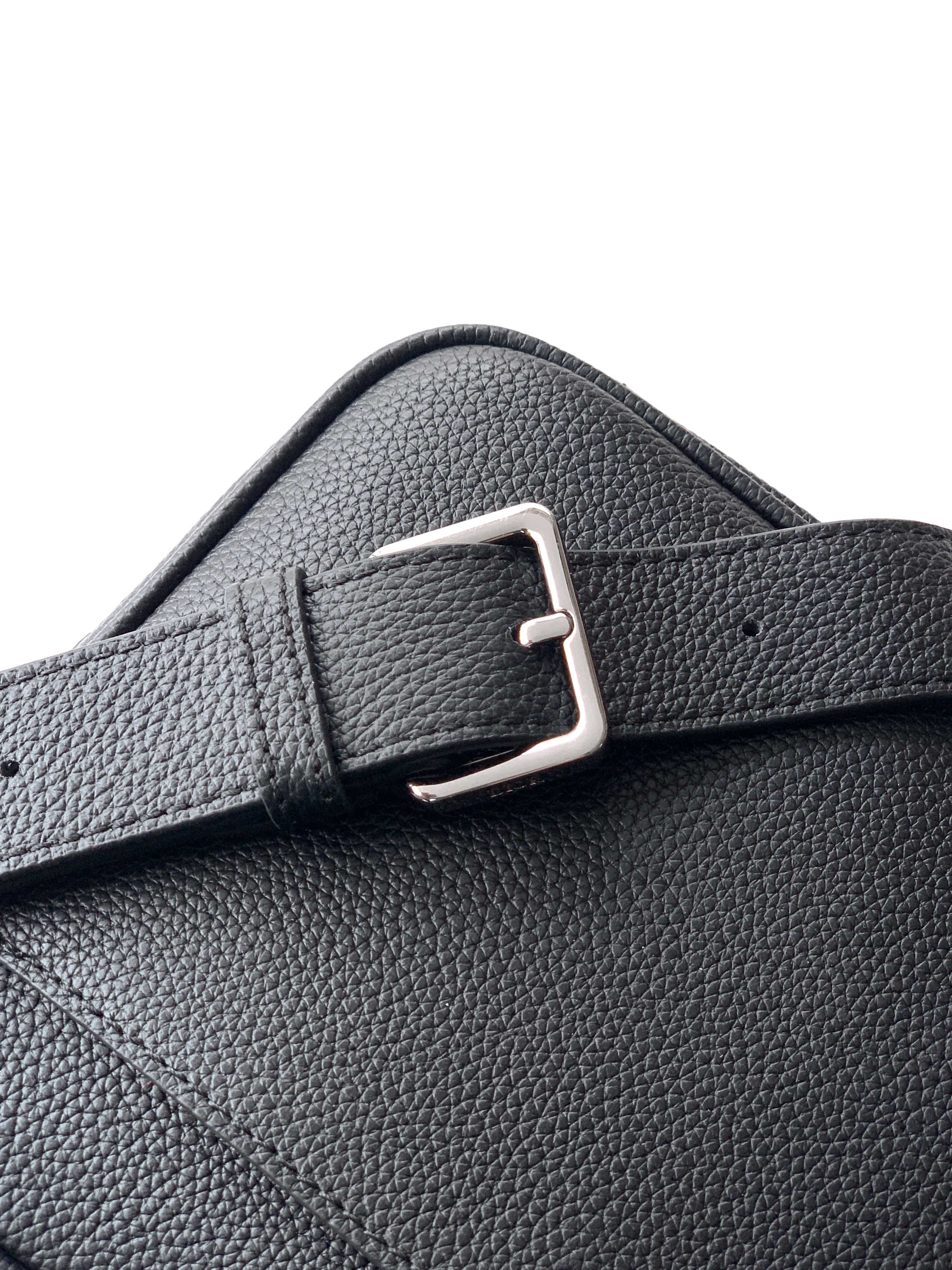 Dior leather strap with silver buckle and pebble-grain texture