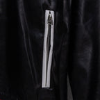 Amiri black leather jacket with zippered front pocket and silver zipper pull