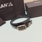 Chanel leather belt with oval gold buckle, black strap and CC-style logo
