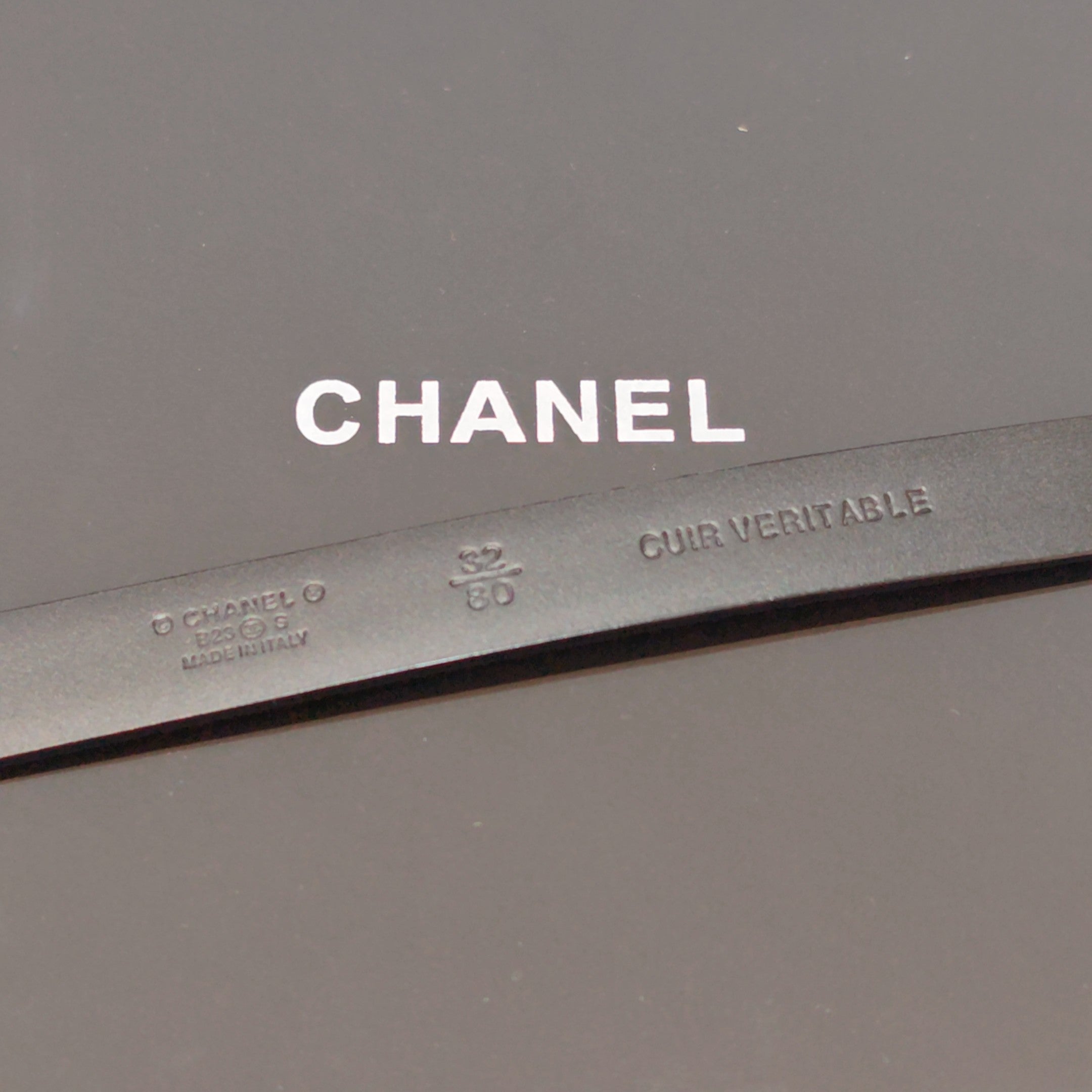 Chanel belt inner label with text 'Cuir Veritable' and size markings