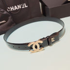 Chanel belt laid flat, dark brown leather strap with rose-gold double C buckle
