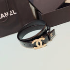 Chanel belt with black leather strap and rose-gold double C buckle, side view