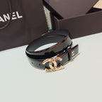 Chanel belt with glossy black strap and rose-gold buckle with CC logo center