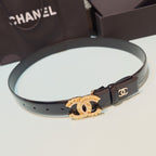 Chanel belt with dark leather strap and gold CC plaque with small stone accents