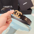 Chanel belt in dark leather with gold-tone CC buckle and rhinestone trim