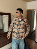 Plaid button-up jacket in beige, navy, and red with black trim