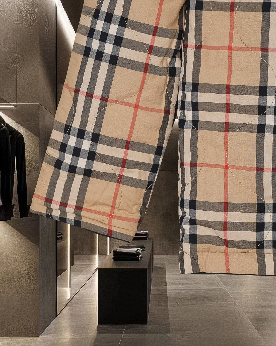 Burberry plaid jacket side view with long sleeves and buttoned front, beige black red check