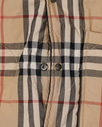 Long plaid coat with beige, black, and red check pattern and front button closure