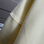 Moncler crewneck sweatshirt sleeve and cuff in light cream fabric close-up