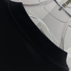 Black ribbed crew-neck T-shirt with shoulder seam detail