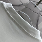 Dior white short-sleeve T-shirt shoulder and collar seam close-up