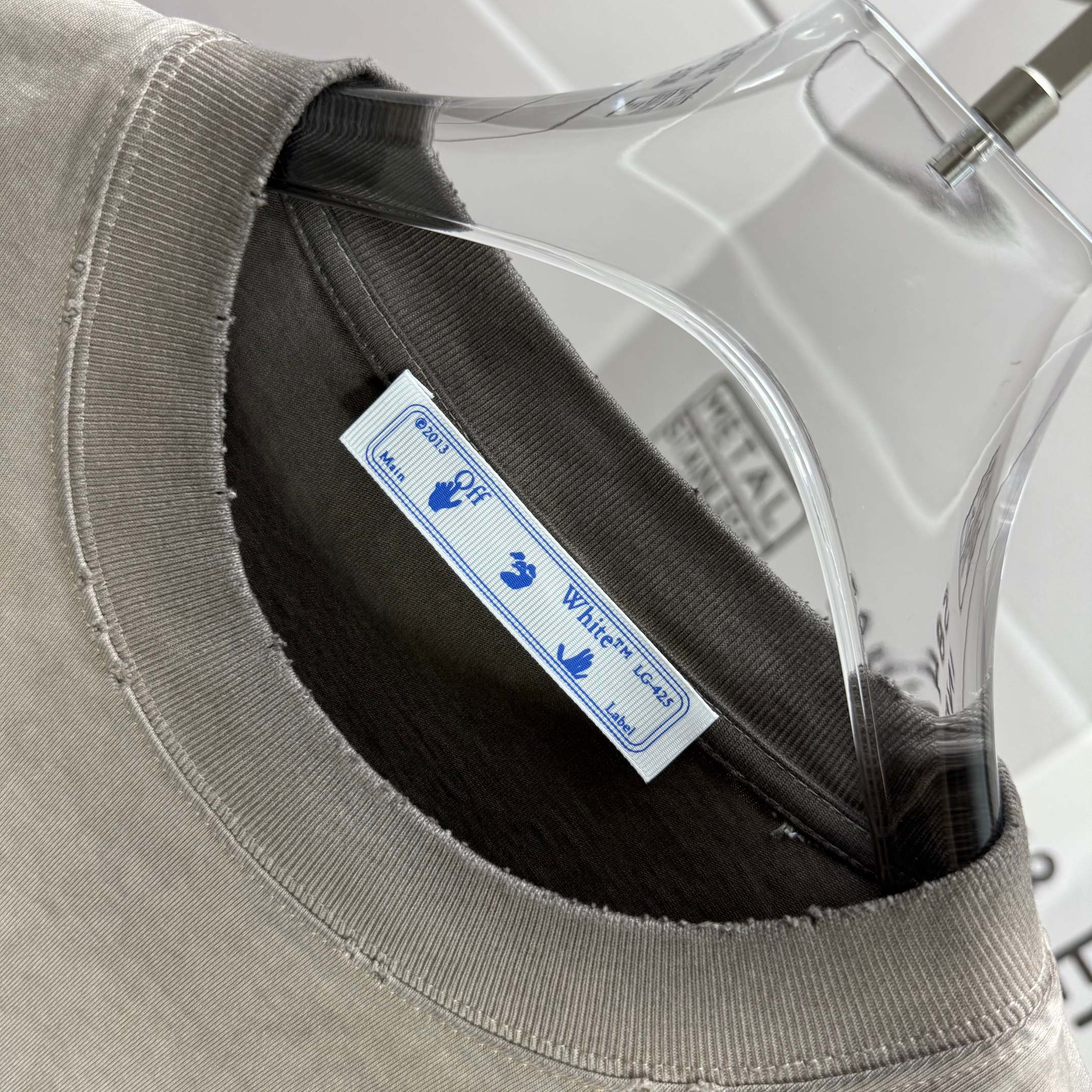 Crew-neck T-shirt detail with inner size label tag