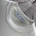 Off-white T-shirt neckline with white rib collar and inner label