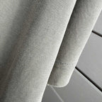 Gray T-shirt fabric with sleeve seam detail and stitched hem