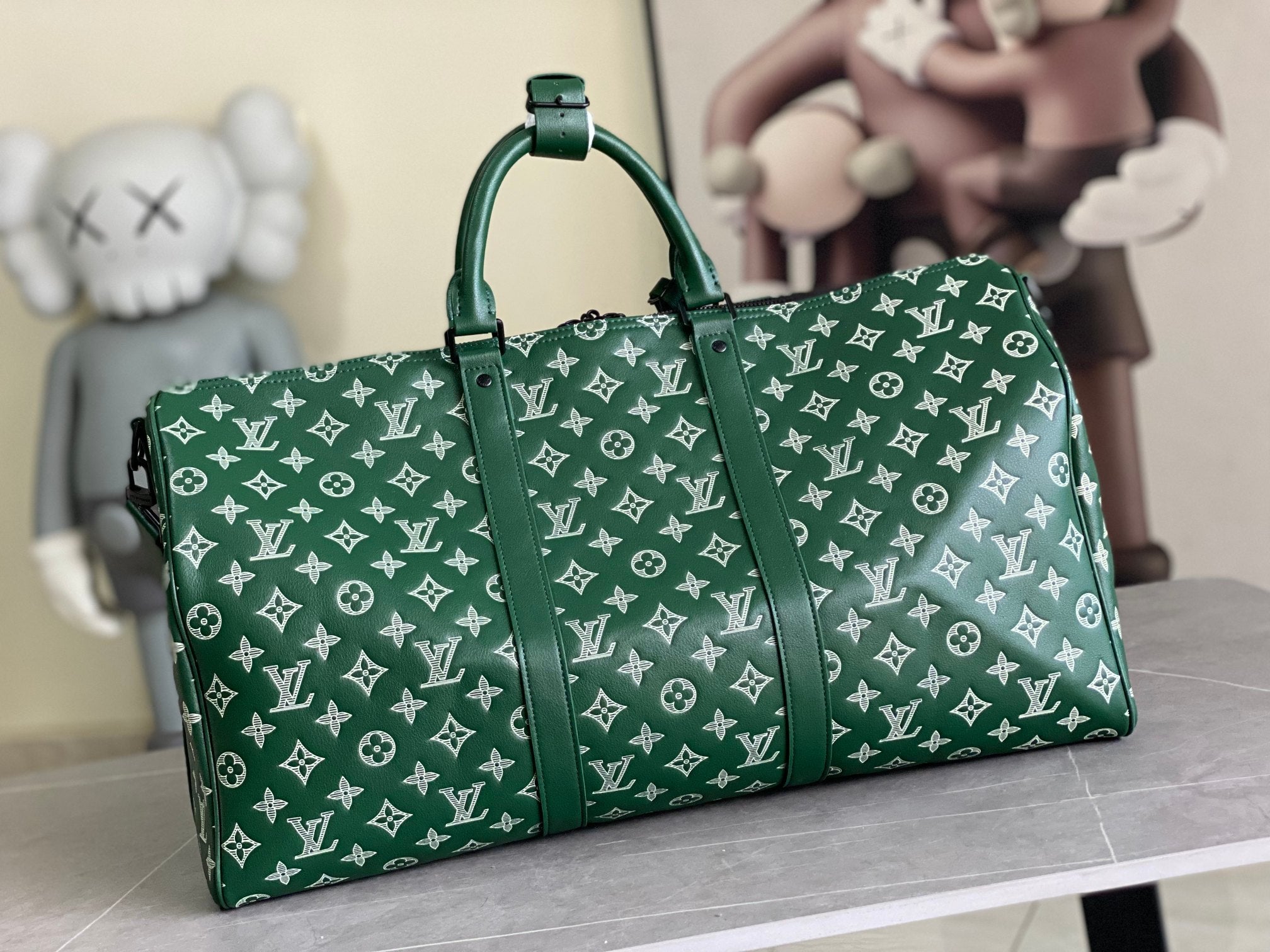 Men’s Louis Vuitton green monogram duffel bag with top handles and front view