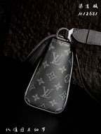 Monogram crossbody pouch bag with zip closure and adjustable strap