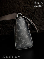 Monogram leather crossbody bag with metal ring strap and zipper