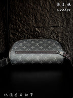 Monogram mini crossbody bag with rounded top zipper and front panel
