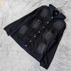 Navy hooded denim jacket with snap front and two chest pockets, laid diagonally.