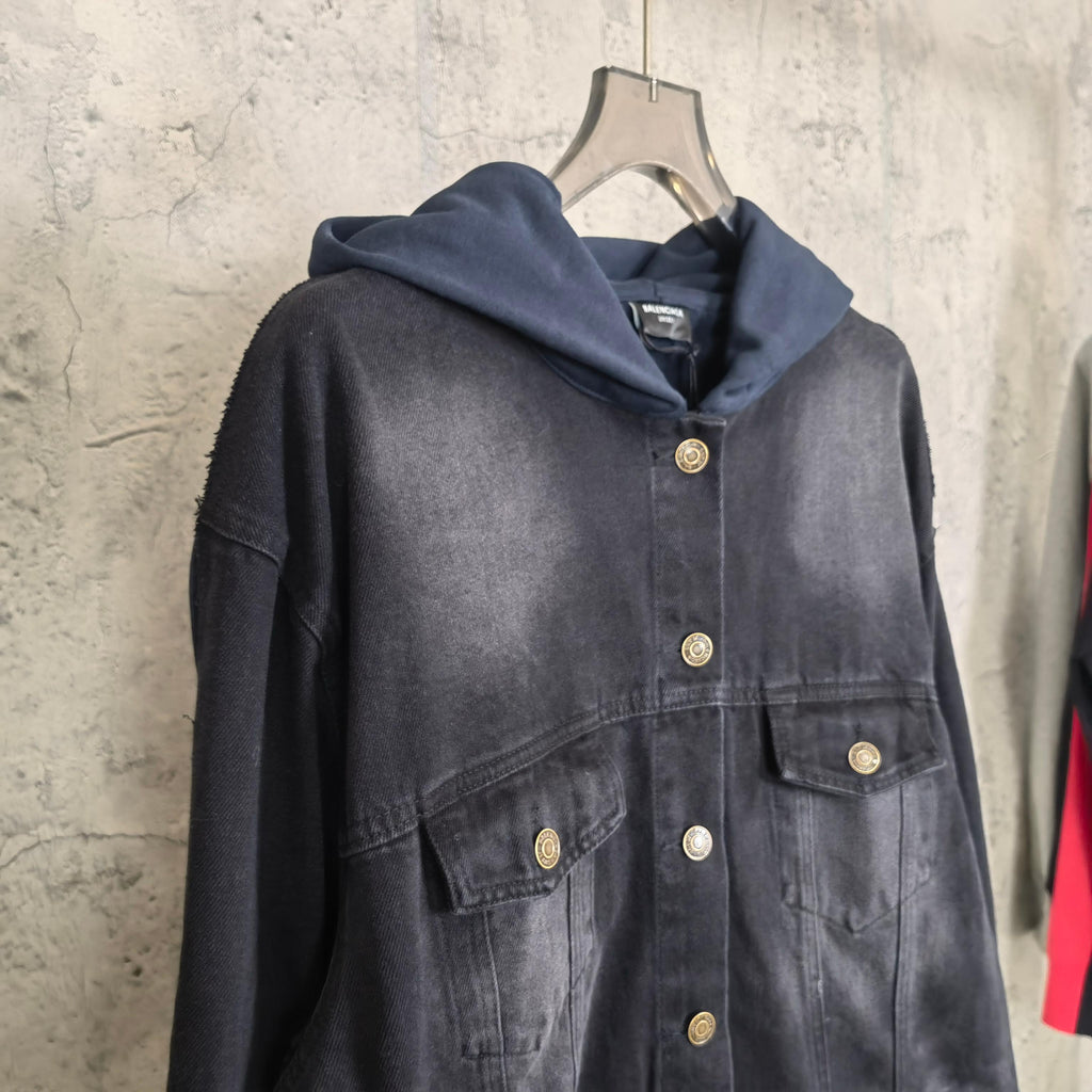 Navy hooded denim jacket with gold snap buttons and chest pockets, front view.