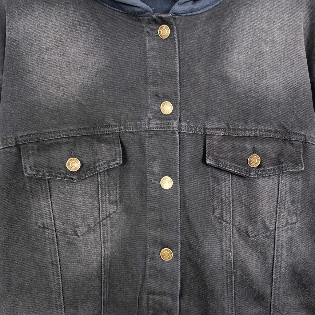 Balenciaga long denim jacket, close-up of snap buttons and flap chest pockets