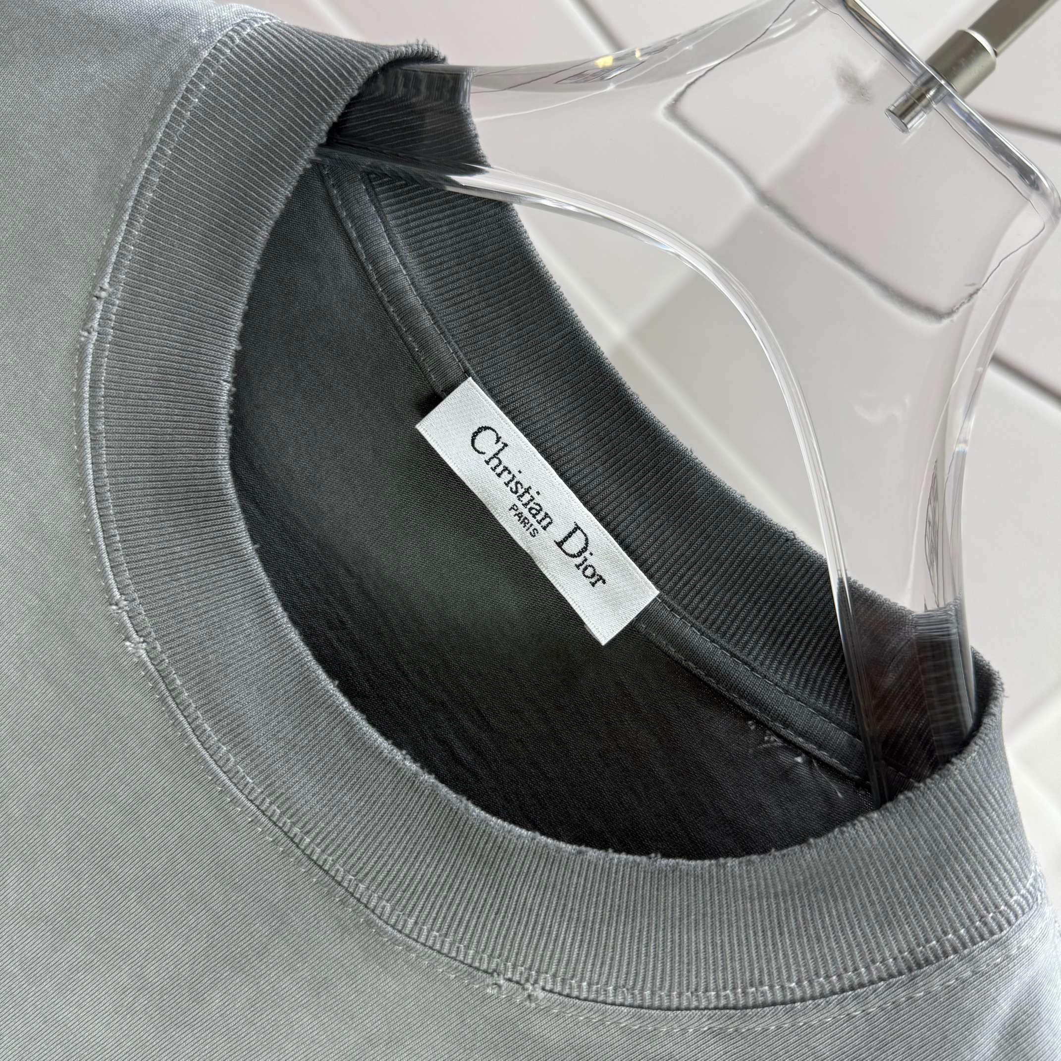 Crewneck T-shirt in muted gray-green with interior brand label at neckline