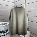 Stone Island T-shirt, light gray-green, back view with plain crew neck