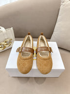 Tan suede flats with buckled strap and cream shearling lining, pair on box