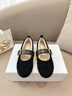 Women's black Dior loafers with gold buckle and shearling-lined footbed