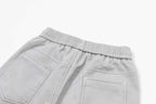 Light gray denim-style pants with elastic waist and stitched pockets