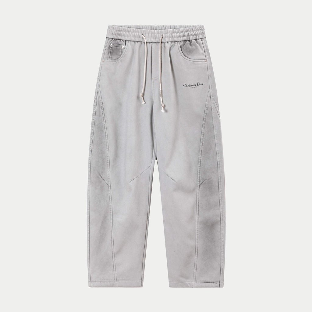 Light gray drawstring pants with elastic waistband and side pockets