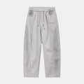 Light gray drawstring pants with elastic waistband and side pockets