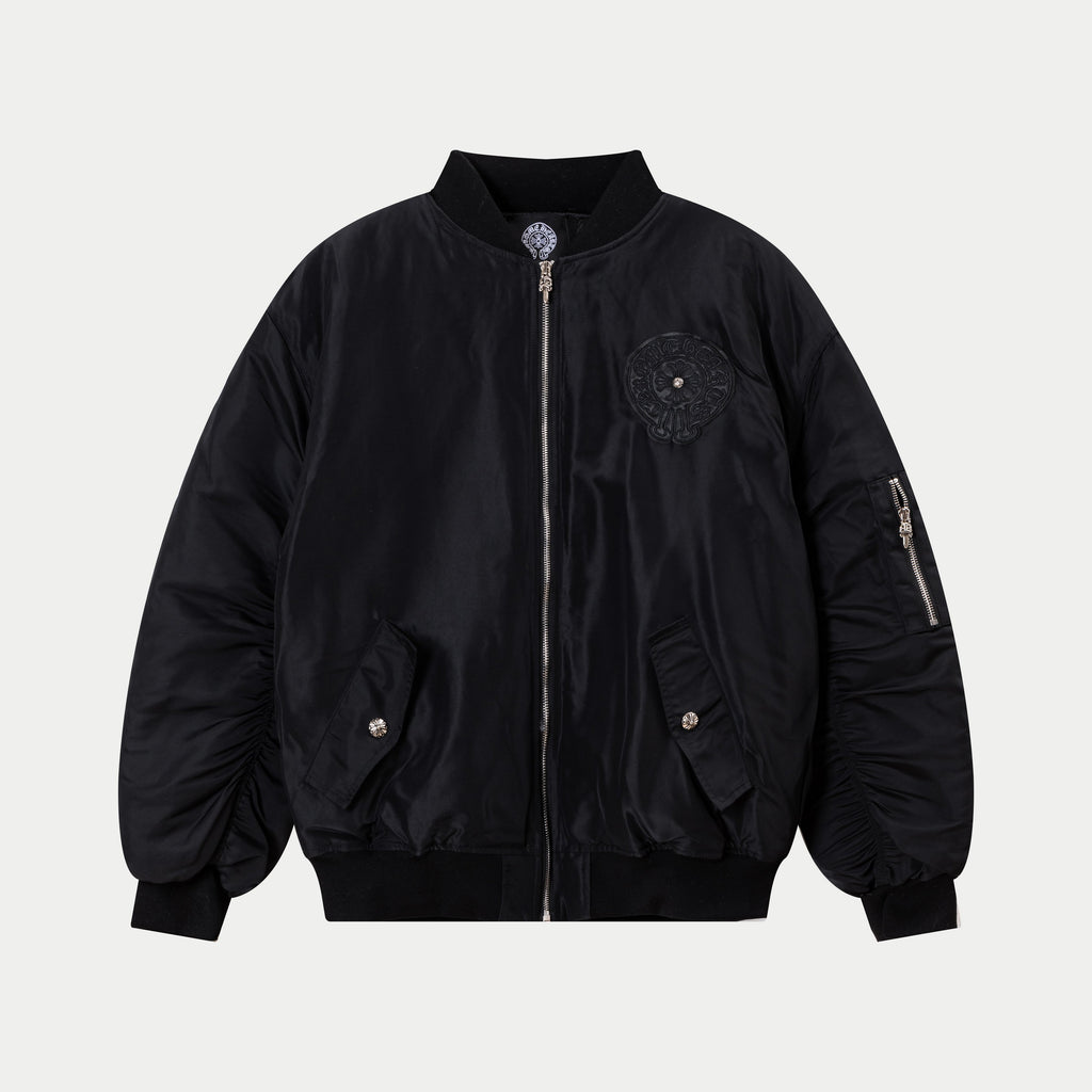 Black bomber jacket with front zipper, ribbed collar, and chest decorative patches