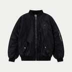 Black bomber jacket with front zipper, ribbed collar, and chest decorative patches