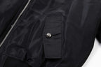 Black bomber jacket sleeve pocket with snap button and gathered cuff