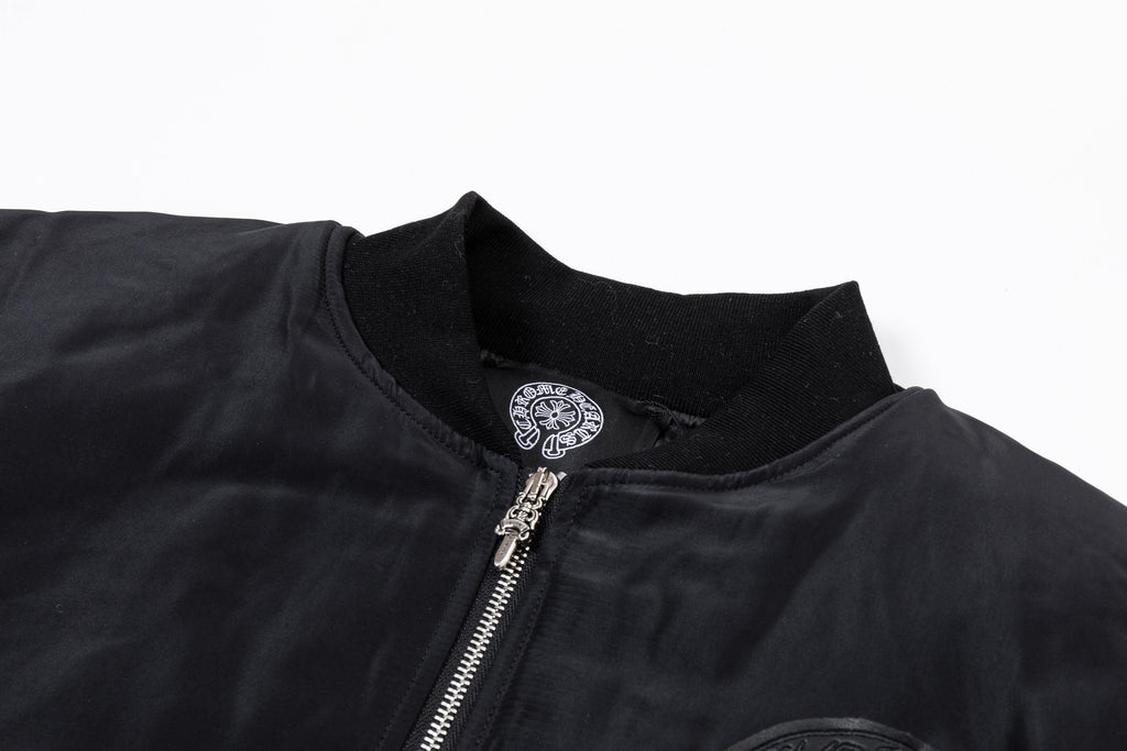Black bomber jacket neckline with zip closure and small chest emblem