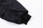 Black long pants with elastic waistband and gathered cuffs