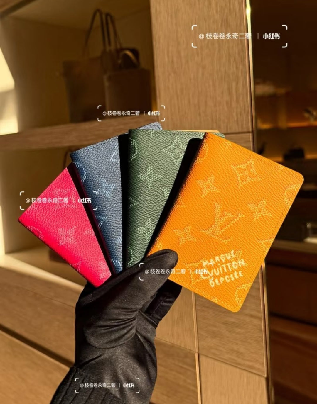 Set of five Louis Vuitton small pouches in pink, navy, green, and orange tones
