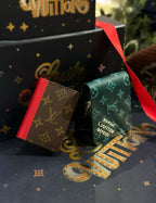 Louis Vuitton small pouch set: brown monogram cardholder and green monogram pouch