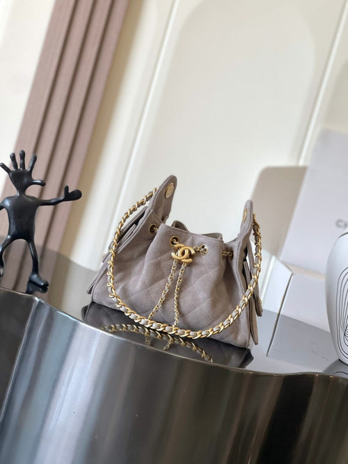 Chanel small flap bag, light gray suede, gold chain shoulder strap