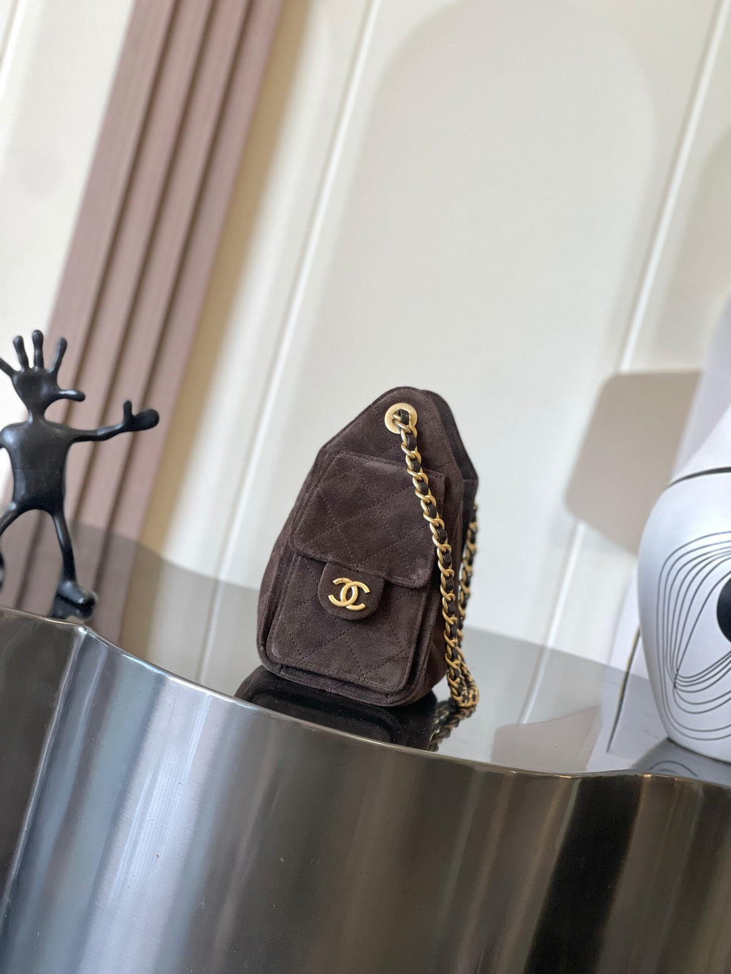 Dark brown suede shoulder bag with flap, gold chain strap, CC logo