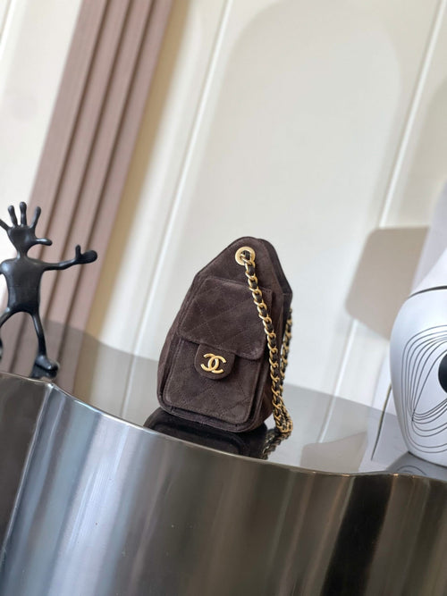Dark brown suede shoulder bag with flap, gold chain strap, CC logo