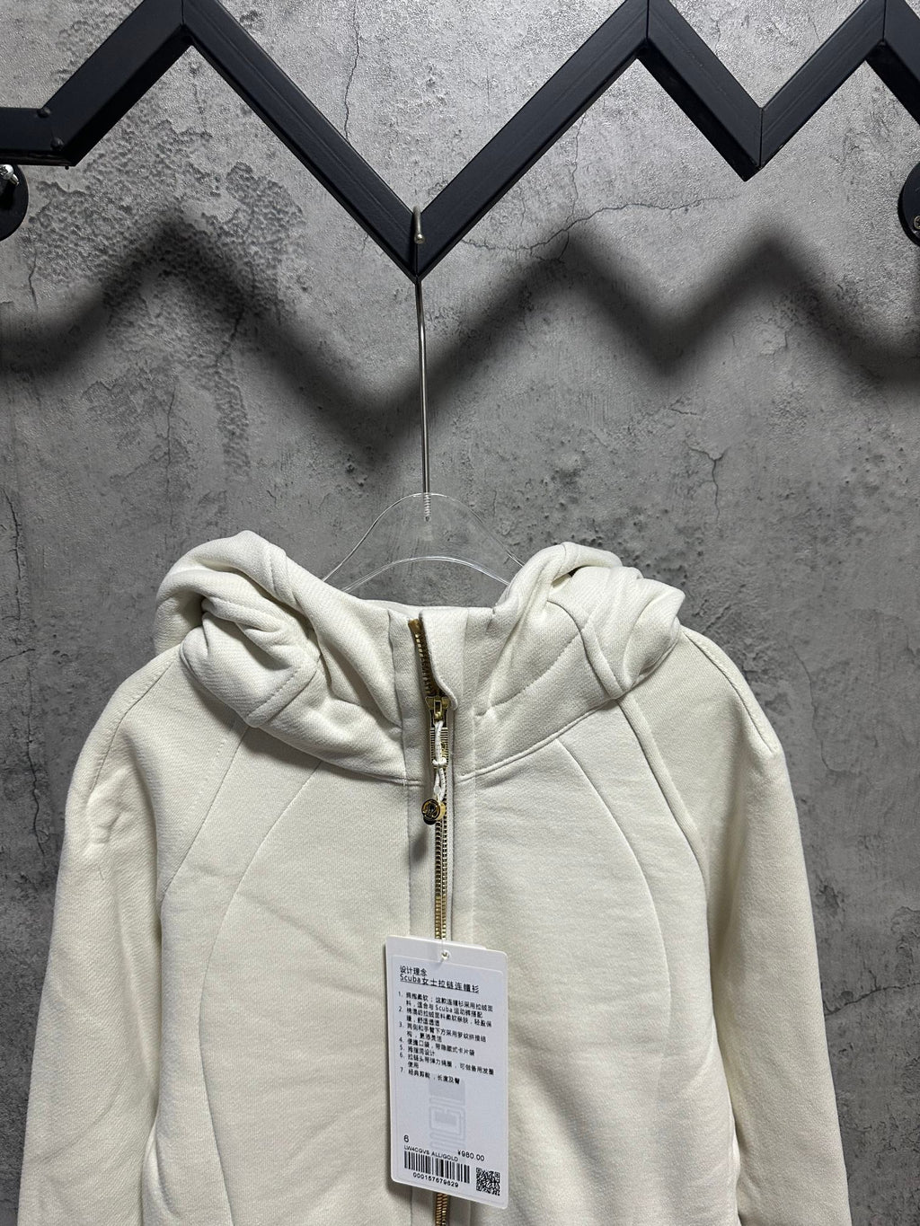 Ralph Lauren off-white zip-up hoodie front view with hood and size tags