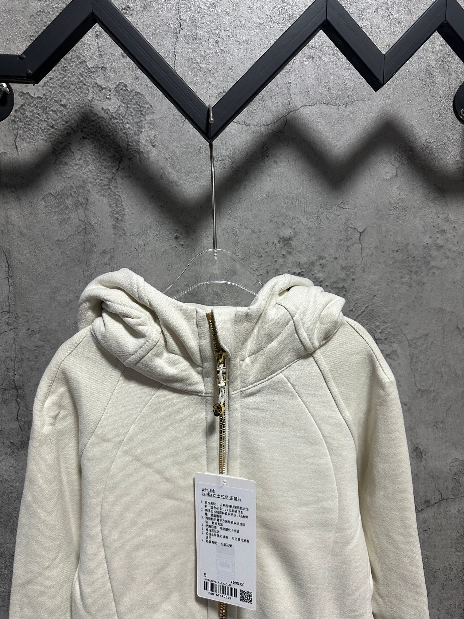 Ralph Lauren off-white zip-up hoodie front view with hood and size tags