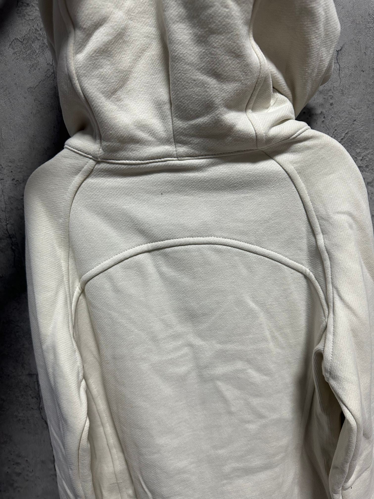 Ralph Lauren light cream zip-up hoodie back view with hood and curved seam details