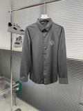 Versace button-up dress shirt, grey with crest logo on chest.